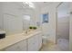 Clean bathroom with a single vanity and walk-in shower at 1412 Sea Fan Dr, Punta Gorda, FL 33950