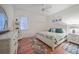 Charming bedroom with a queen-size bed and hardwood floors at 1412 Sea Fan Dr, Punta Gorda, FL 33950