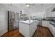 Large kitchen with stainless steel appliances and granite island at 1412 Sea Fan Dr, Punta Gorda, FL 33950