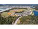 Aerial view of community with sports fields and lake at 16255 Lady Palm Dr, Port Charlotte, FL 33953
