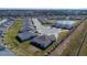 Aerial view of neighborhood with pond at 16255 Lady Palm Dr, Port Charlotte, FL 33953