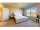 Spacious bedroom with large window and plush carpet at 16255 Lady Palm Dr, Port Charlotte, FL 33953
