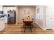 Charming dining area with wood table and leather chairs at 16255 Lady Palm Dr, Port Charlotte, FL 33953