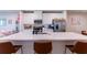 Kitchen island with seating, ideal for casual dining at 16255 Lady Palm Dr, Port Charlotte, FL 33953