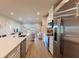 Bright kitchen features stainless steel appliances and an island at 16255 Lady Palm Dr, Port Charlotte, FL 33953