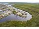 Aerial view of waterfront home with private dock at 16920 Ohara Dr, Port Charlotte, FL 33948