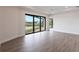 Bright bedroom with water views and sliding glass doors at 16920 Ohara Dr, Port Charlotte, FL 33948