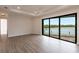 Spacious bedroom with water views and sliding glass doors at 16920 Ohara Dr, Port Charlotte, FL 33948