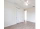 Bedroom with double doors and hardwood floors at 16920 Ohara Dr, Port Charlotte, FL 33948