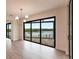 Bright dining room with sliding glass doors and water views at 16920 Ohara Dr, Port Charlotte, FL 33948