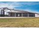 Modern home exterior with a covered lanai and pool at 16920 Ohara Dr, Port Charlotte, FL 33948