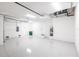 Clean and spacious garage featuring epoxy flooring and extra space at 16920 Ohara Dr, Port Charlotte, FL 33948