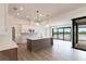 Spacious kitchen island, modern appliances, and water views at 16920 Ohara Dr, Port Charlotte, FL 33948