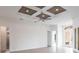 Spacious living area with high ceilings and a coffered design at 16920 Ohara Dr, Port Charlotte, FL 33948