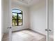 Bright office with arched window and wood-look floors at 16920 Ohara Dr, Port Charlotte, FL 33948