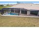 Newly built home with a large, screened-in pool and spa at 16920 Ohara Dr, Port Charlotte, FL 33948