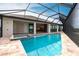 Relaxing screened pool and spa, perfect for outdoor entertaining at 16920 Ohara Dr, Port Charlotte, FL 33948
