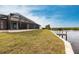 Beautiful waterfront property with private dock and lush lawn at 16920 Ohara Dr, Port Charlotte, FL 33948