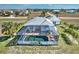 Property with a large backyard and screened-in pool at 17455 Boca Vista Rd, Punta Gorda, FL 33955