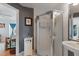 Small bathroom with pedestal sink and a shower stall at 17455 Boca Vista Rd, Punta Gorda, FL 33955