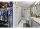 Bathroom features shower, granite countertop, and a large closet at 17455 Boca Vista Rd, Punta Gorda, FL 33955