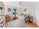 Cozy bedroom with daybed, built-in shelving, and a window seat at 17455 Boca Vista Rd, Punta Gorda, FL 33955