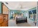 Spacious bedroom with a wooden dresser and an ornate bed frame at 17455 Boca Vista Rd, Punta Gorda, FL 33955