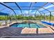 Inviting screened pool with paver deck at 17455 Boca Vista Rd, Punta Gorda, FL 33955