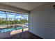 Relaxing screened pool area with water feature at 17455 Boca Vista Rd, Punta Gorda, FL 33955