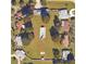 Aerial view of residential neighborhood showing several homes each with a swimming pool at 181 Coconut St, Punta Gorda, FL 33980