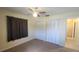 Bedroom with double closets and a ceiling fan at 181 Coconut St, Punta Gorda, FL 33980