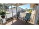 Relaxing screened lanai featuring cozy seating and views of the outdoors at 181 Coconut St, Punta Gorda, FL 33980