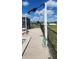 Poolside outdoor shower with easy access and green hose at 181 Coconut St, Punta Gorda, FL 33980