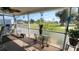 Screened-in patio with a table and view of the backyard at 181 Coconut St, Punta Gorda, FL 33980