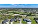 Aerial view of house and golf course at 20 Medalist Cir, Rotonda West, FL 33947