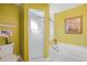 Spa-like bathroom with a walk-in shower, soaking tub, and decorative glass at 20 Medalist Cir, Rotonda West, FL 33947