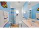 Fun ' bathroom with colorful shower curtain and nautical theme at 20 Medalist Cir, Rotonda West, FL 33947