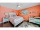 Relaxing Primary bedroom with a king-size bed and coastal decor at 20 Medalist Cir, Rotonda West, FL 33947