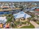 Waterfront property aerial view, highlighting home features and canal location at 2198 El Cerito Ct, Punta Gorda, FL 33950