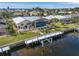 Luxury waterfront home with private dock and pool, aerial perspective at 2198 El Cerito Ct, Punta Gorda, FL 33950