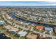 High-level view of property and surrounding neighborhood, showing canal access at 2198 El Cerito Ct, Punta Gorda, FL 33950