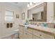 Clean bathroom with updated vanity and tiled floor at 2198 El Cerito Ct, Punta Gorda, FL 33950
