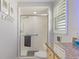 Bathroom with a walk-in shower, granite countertop, and modern fixtures at 2198 El Cerito Ct, Punta Gorda, FL 33950