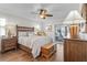 Main bedroom with wood floors and access to a private gym at 2198 El Cerito Ct, Punta Gorda, FL 33950