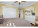 Bright bedroom with double doors leading to a large closet and dresser at 2198 El Cerito Ct, Punta Gorda, FL 33950