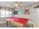 Game room featuring a pool table, dartboard, and mounted TV at 2198 El Cerito Ct, Punta Gorda, FL 33950