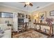 Home office features built-in storage and a comfortable sofa at 2198 El Cerito Ct, Punta Gorda, FL 33950