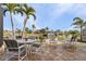 Relaxing patio overlooking the canal with outdoor seating at 2198 El Cerito Ct, Punta Gorda, FL 33950