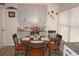 Kitchen dinette with round table and four chairs at 24148 Buckingham Way, Port Charlotte, FL 33980