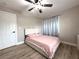 Bright bedroom with plush bedding and modern flooring at 28301 N Twin Lakes Dr, Punta Gorda, FL 33955